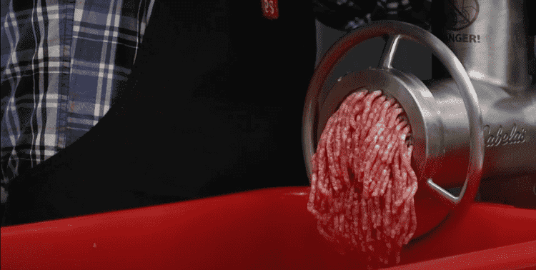 Image of Grind the meat a second time. Then you can break down the grinder. This two-step grinding process creates the ideal coarse-cut texture for traditional ring bologna. 