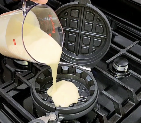 Image of Pour your waffle batter a quarter of the way in...
