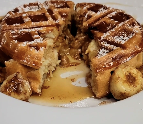 Image of Serve the peanut butter and banana stuffed waffle warm and...