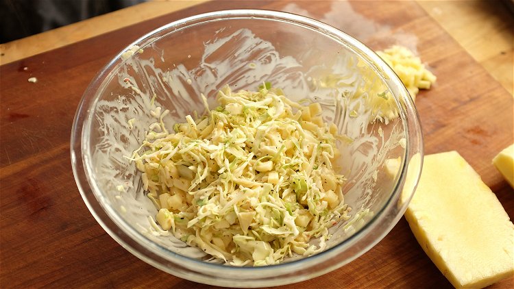 Image of To make the Coconut Pineapple Slaw, combine all ingredients except...