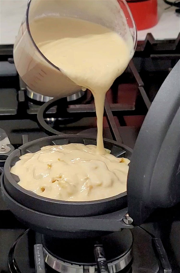 Image of Proceed to cover the filling with the waffle batter and...