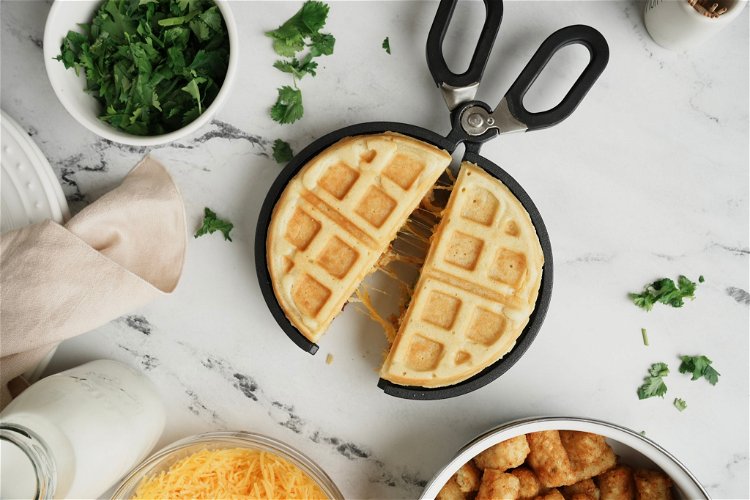 Image of Remove the waffle from The Stuffed Waffle Iron using the...