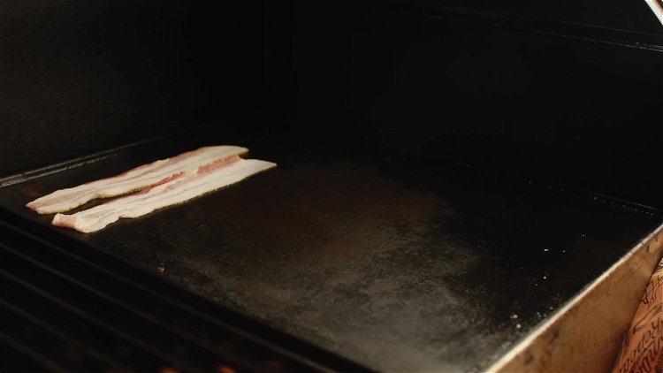 Image of Place your bacon on the cast iron griddle, inside the...