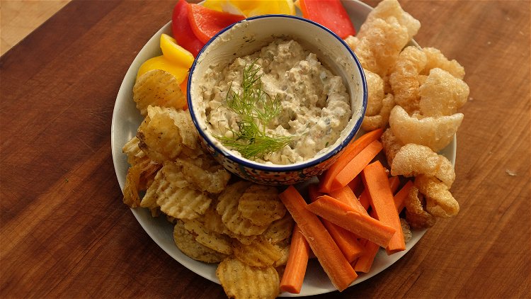 Image of Serve with chips, pork rinds and/or veggies for dipping.