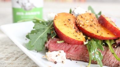 Image of GRILLED FLANK STEAK WITH PEACHES AND ARUGULA