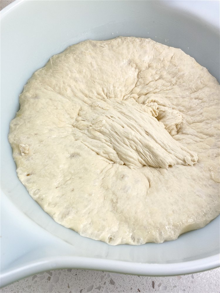 Image of When the dough is almost ready, place the top oven...