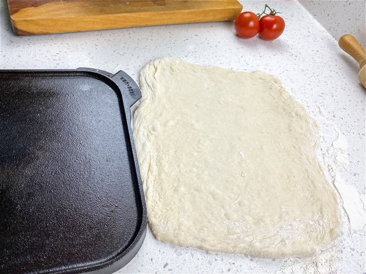 Image of Once the dough has doubled in size, punch it down...