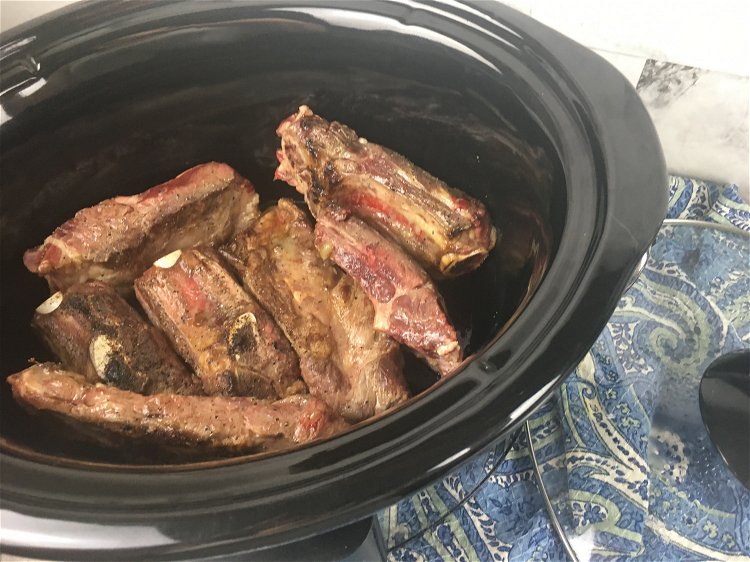 Image of Transfer the browned ribs to a 6 quart or larger...
