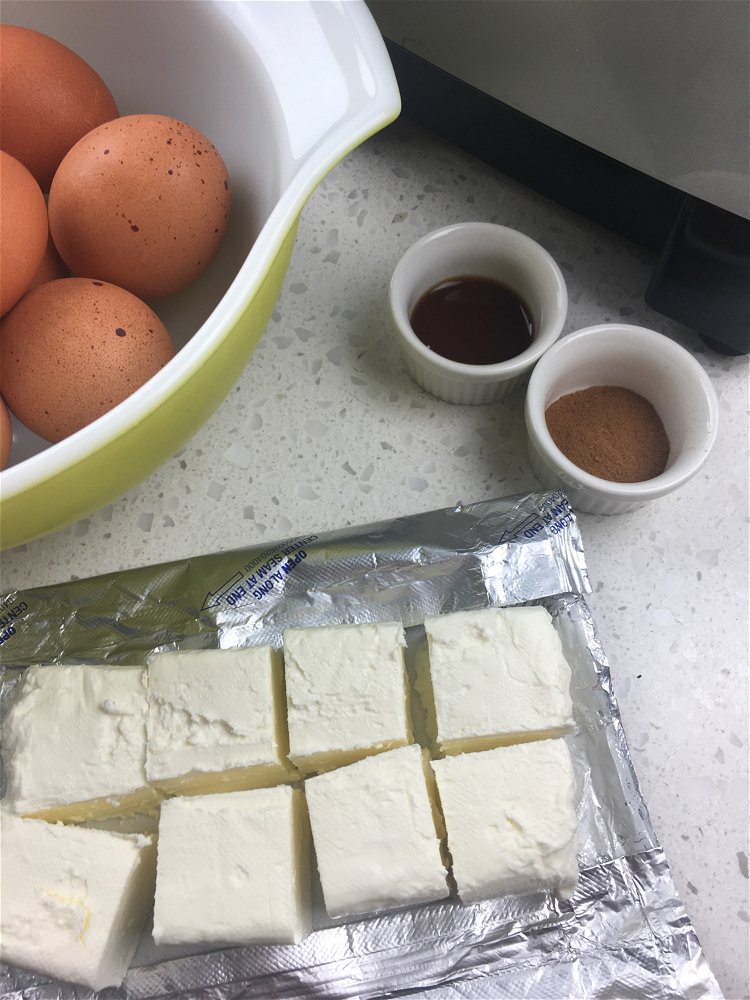 Image of Add cream cheese, eggs, cinnamon, and vanilla extract to a...