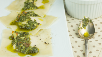 Image of ROASTED SWEET POTATO RAVIOLI WITH CILANTRO ALMOND PESTO