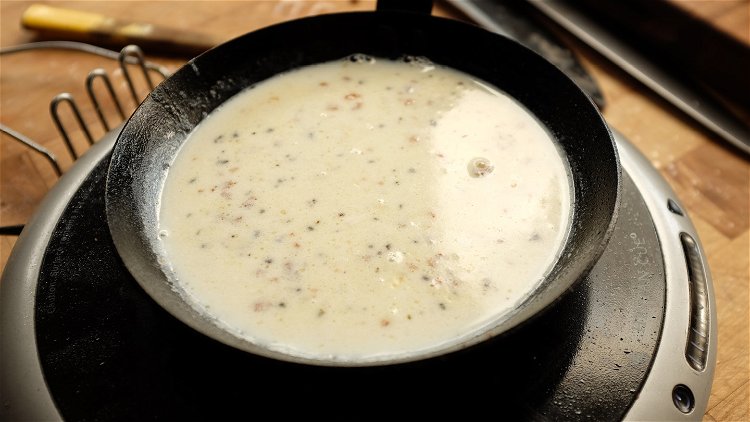 Image of While the potatoes cook, make the Sausage Cream Gravy. Heat...