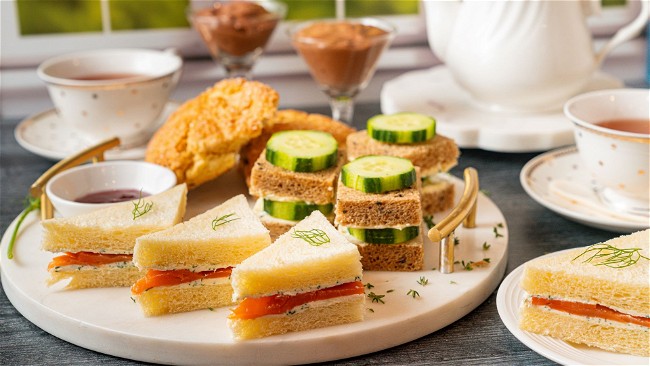 Image of English Afternoon Tea with Sandwiches, Scones, and a Sweet Treat