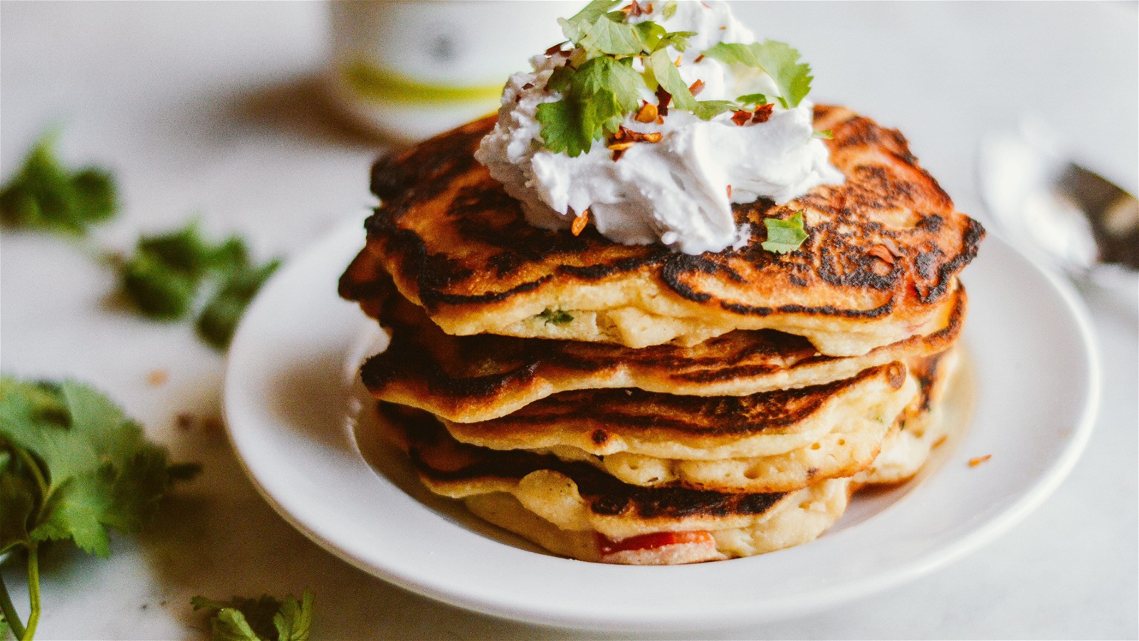 Image of SPICY CURRY BESAN PANCAKES WITH COCONUT CREAM
