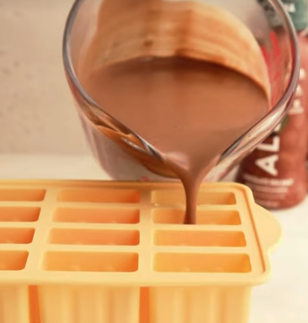 Image of Pour mixture into popsicle molds, then insert popsicle sticks. Freeze...
