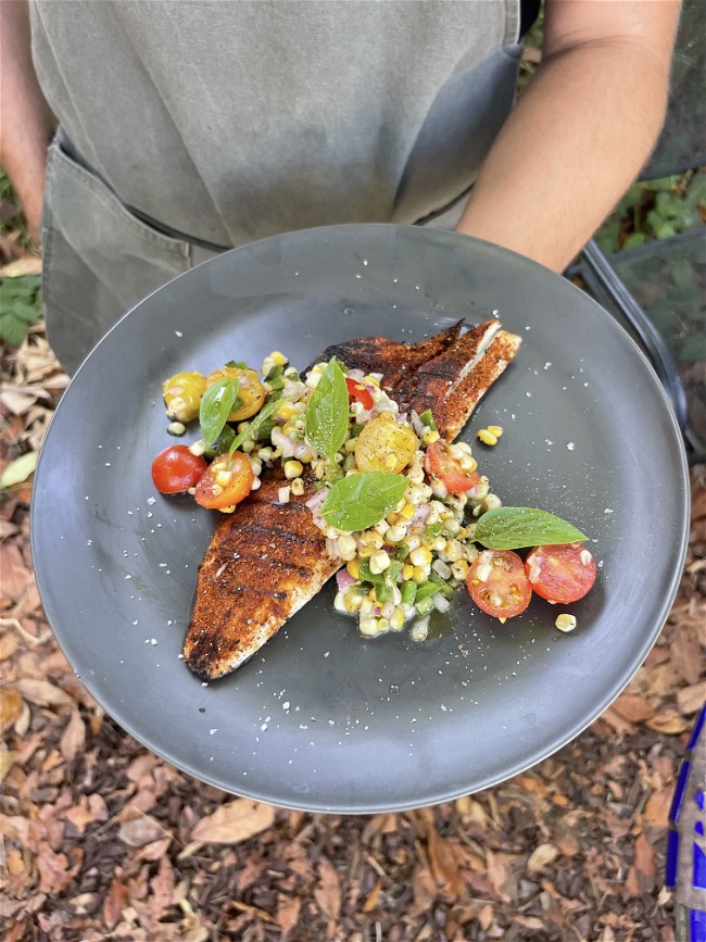 Image of Grilled Branzino with Heirloom Summer Salad I Sweet Corn, tomatoes, jalapeno, lime, basil & more