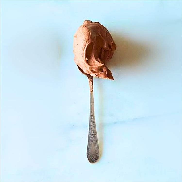 Image of Place chocolate chips in medium size bowl. Bring cream to...