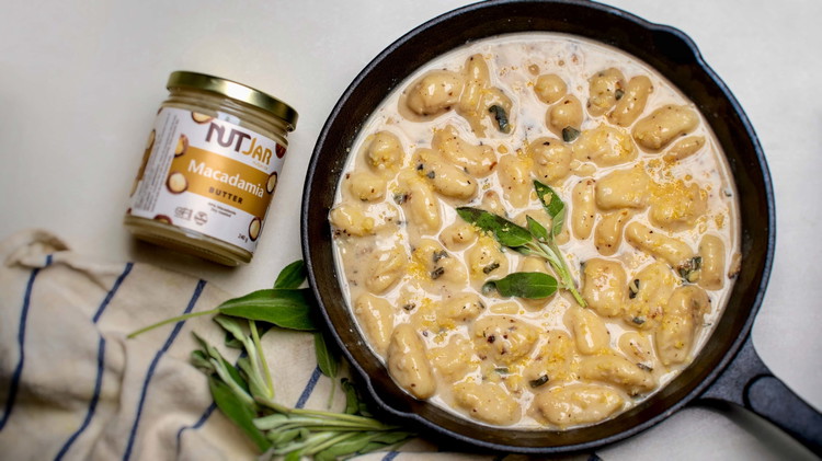 Image of Take the pan off the heat and stir in the parmesan, chopped macadamias. Season with salt and pepper to taste.