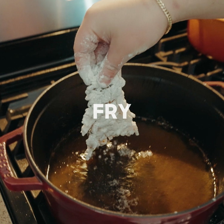 Image of Fry Lobster Tail in hot oil until golden brown, removing gently with a slotted spider spoon and place on cooling rack or paper towels to dry any excess oil and crisp up.