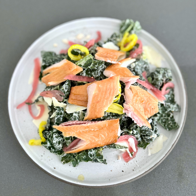 Image of Break apart your trout with your hands or a knife. The skin can remain on for an extra kick of umami flavor, or can be removed easily before breaking apart the fish.