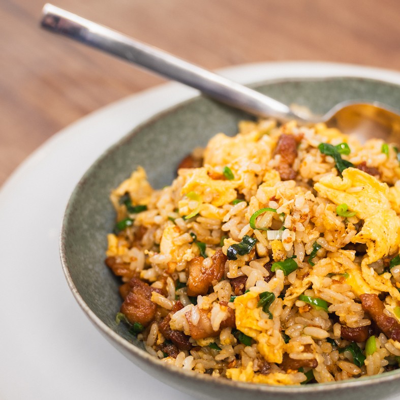 Premium Photo  Fried rice with pork and fried egg in japanese