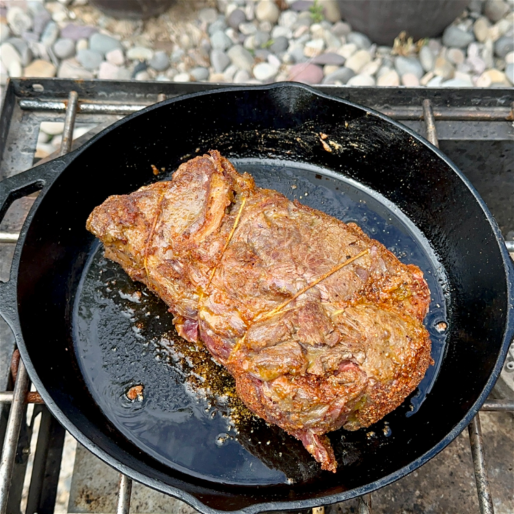Image of After you've seasoned your roast, use a cast iron skillet...