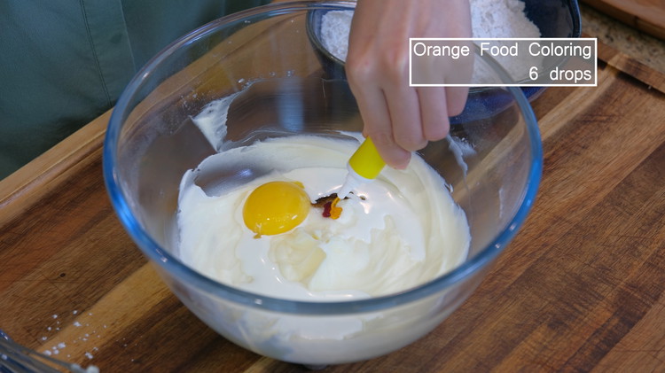 Image of Add whipping cream, egg yolk, salt, vanilla extract, and food coloring (optional), then whisk well.