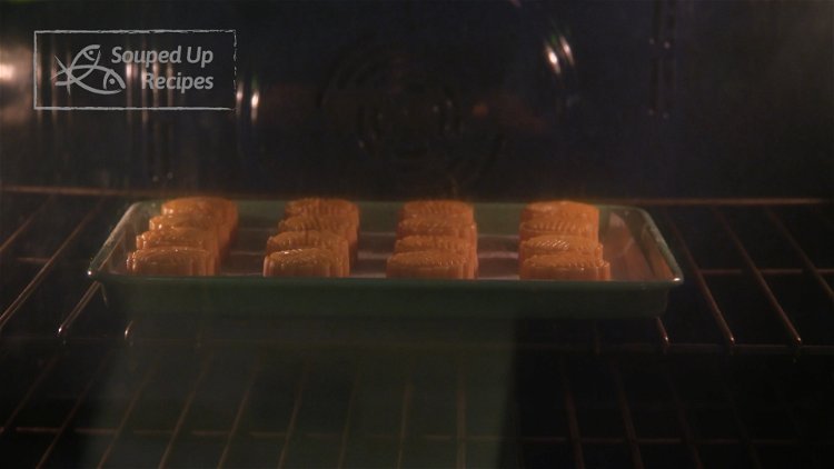 Image of Put the mooncakes back in the oven and bake for...