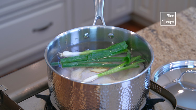 Image of Add chicken leg quarters, ginger slices (about 1.5 inch), 2 scallions, and 1.2L / 5 cups of water to a stock pot and bring it to a boil over medium heat. If you don’t like dark meat, use the same...