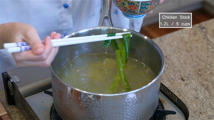 Image of Remove the scallions and ginger slices from the pot. Then...