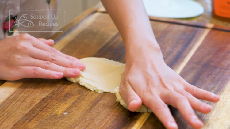 Image of To make the Yousu, microwave the butter until fully melted then pour it into the cake flour. Mix well and let it cool to lukewarm. Use your hand to knead knead the dough for a few minutes or until the...