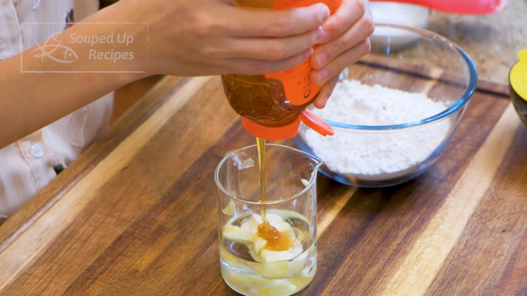 Image of To make the Shuiyoupi (水油皮). Combine the water, butter, and honey in a cup then microwave it on full power for 1-1.5 minutes or until the water is slightly simmering. Pour the mixture into the cake flour and stir to...