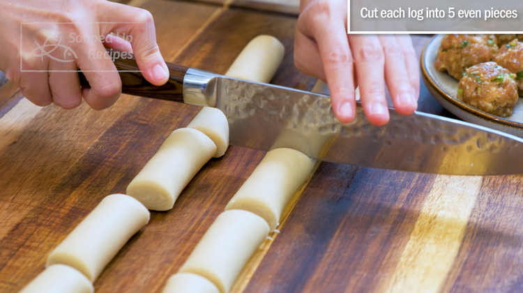 Image of 2 pastry logs have been rested for 15 minutes. Divide each of into 5 even pieces, making a total 10 portions.