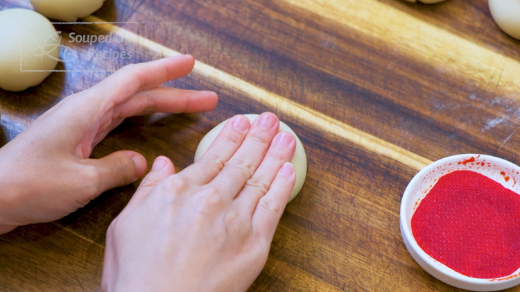 Image of Rest the mooncakes for 15 minutes. Then gently flatten each one into a thick patty.