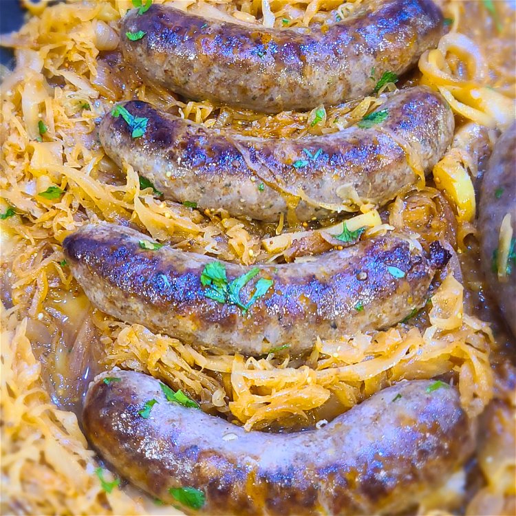 Image of Nestle the seared bratwurst into the sauerkraut mixture. Don’t forget...