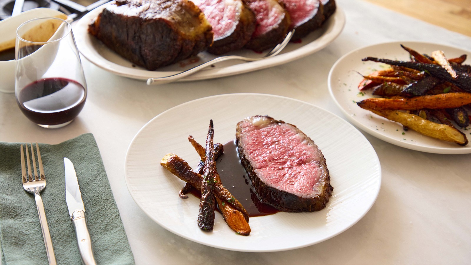 Image of Thomas Keller's Oven Roasted Prime Beef Striploin w/ Red Wine Shallot Sauce