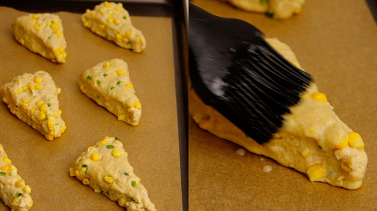 Image of Once the oven has reached the right temperature, brush the top of each scone with the “egg” wash, and bake for about 25 minutes or until golden. 