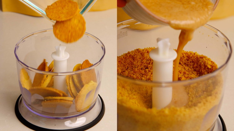 Image of Add the digestive biscuits and salt to your food processor and blitz for about 20 seconds, until evenly and finely ground.  Add the melted vegan butter and blend again until the mixture sticks together.