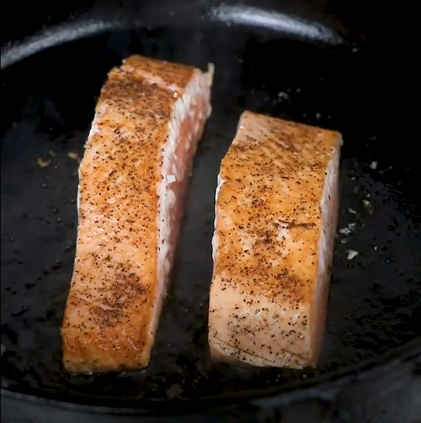 Image of Flip the salmon, lower the heat to medium, and let...