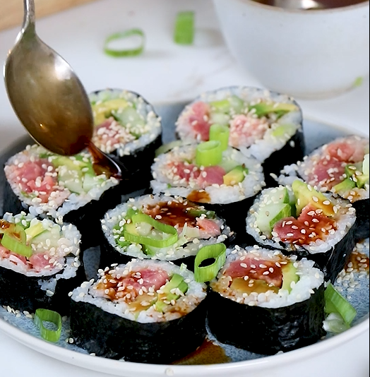 Image of Slice into ½” thick sushi. Serve with soy sauce, wasabi,...
