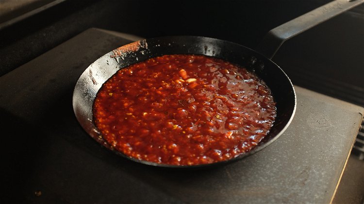 Image of Over medium heat, add the Colonial Chile Oil to a...