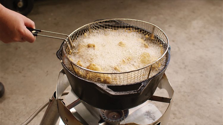 Image of For the second fry, return the basket full of wings...