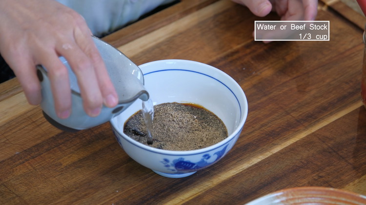 Image of Combine soy sauce, oyster sauce, tomato paste, worcestershire sauce, dark soy sauce, sugar, cornstarch, freshly ground black pepper, and 1/3 cup of water in a bowl and set aside. You can use beef stock if you have some but water...