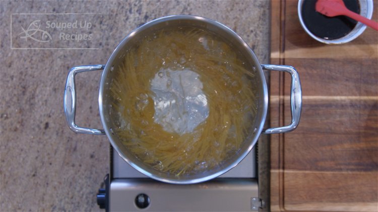 Image of Boil the spaghetti in a big pot of water for...