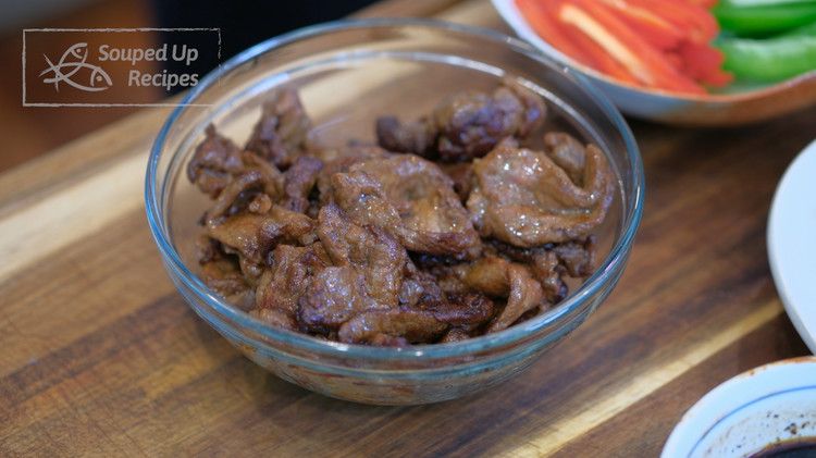 Image of Remove the beef from the wok and set aside. Make sure you tilt the wok so you can leave the oil behind.