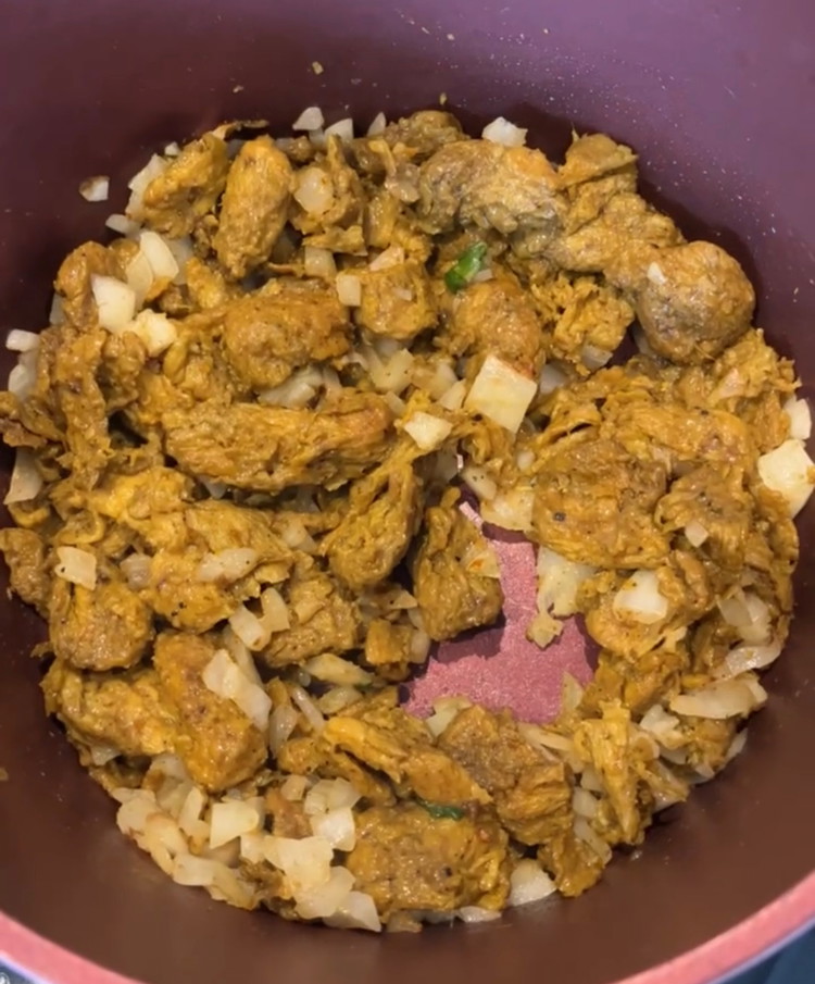 Image of Add G.O.A.T curry protein and curry powder, potatoes cardamom and cloves stir