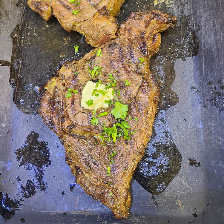 Image of Remove the steaks from the heat and let them rest with a generous pad of butter on top for a few minutes before slicing. This allows the juices to redistribute throughout the meat, and not run out as soon as...