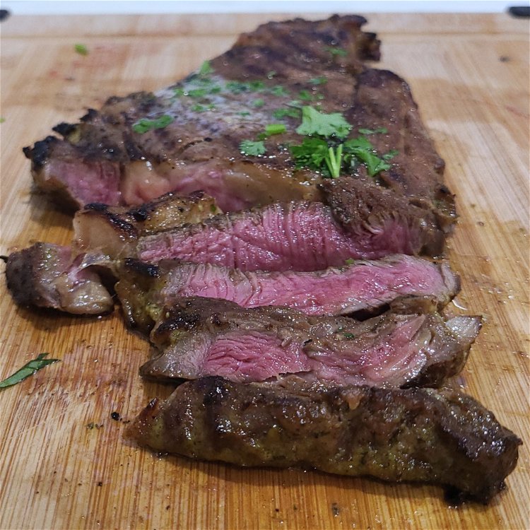 Image of Slice the rested steak into thin strips.