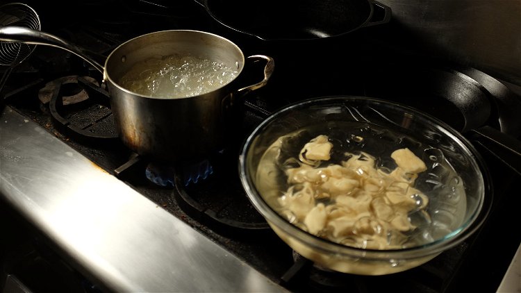 Image of Bring a pot of water to a boil. Cook the...