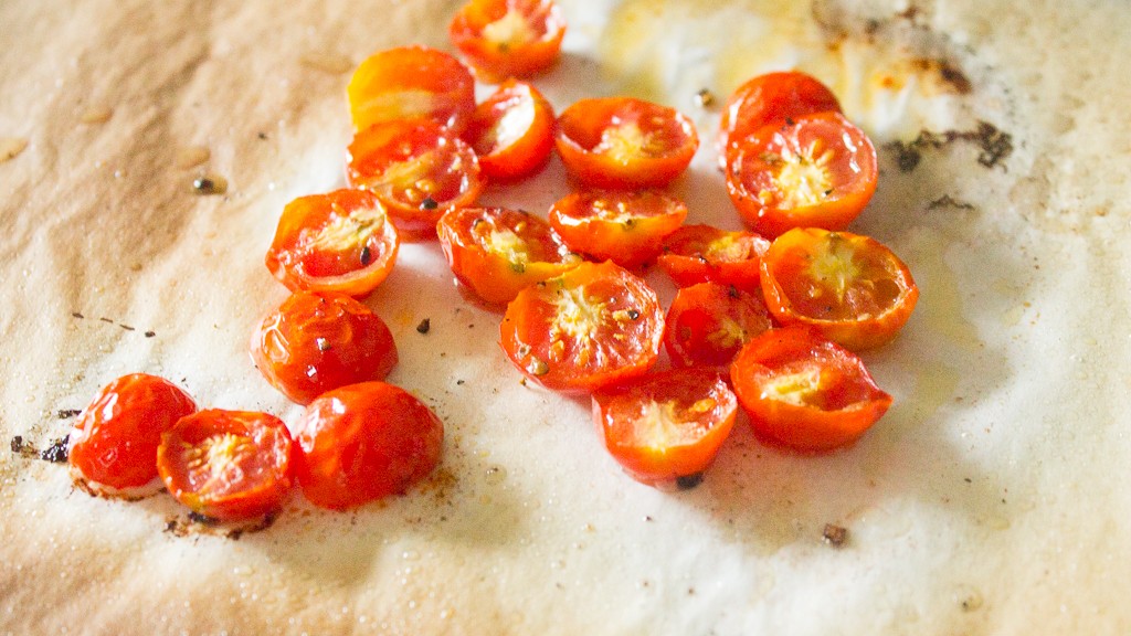 cherry tomatoes on a sheet pan
