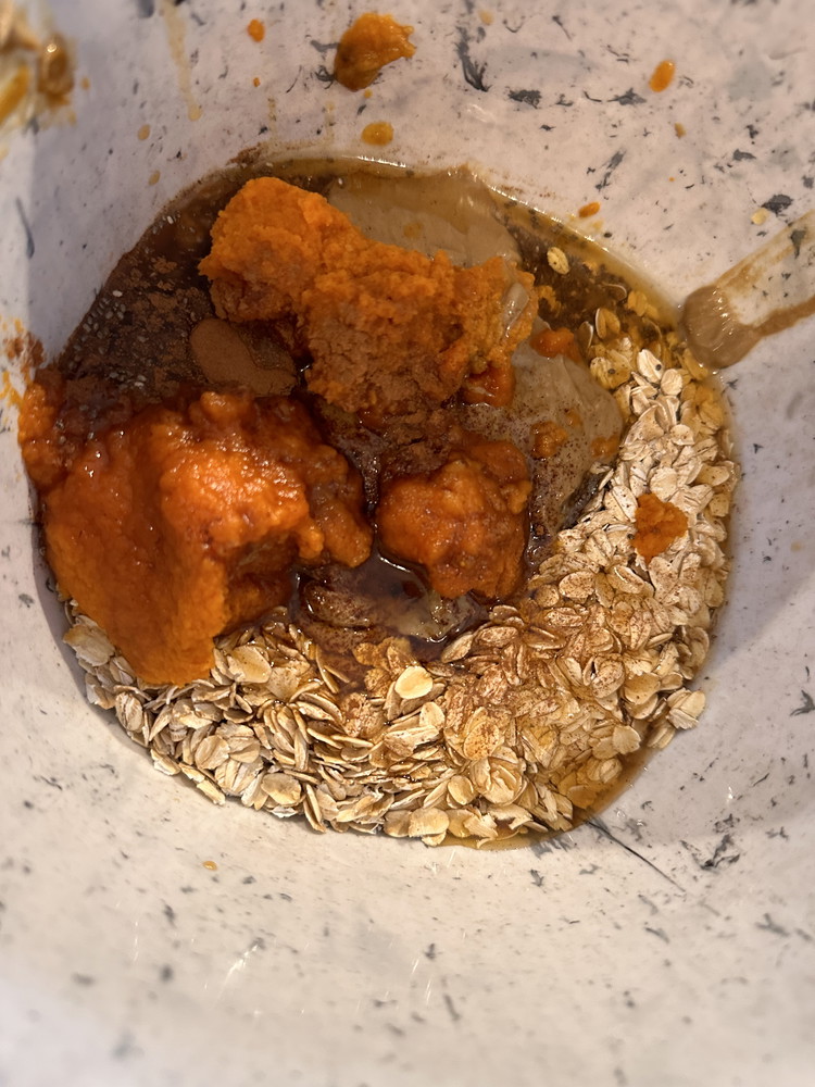 Image of To a bowl add all your ingredients except the mini chocolate chips and start to come bind. The mixture should be soft and not too sticky. You should be able to take a scoop and form into a ball with...